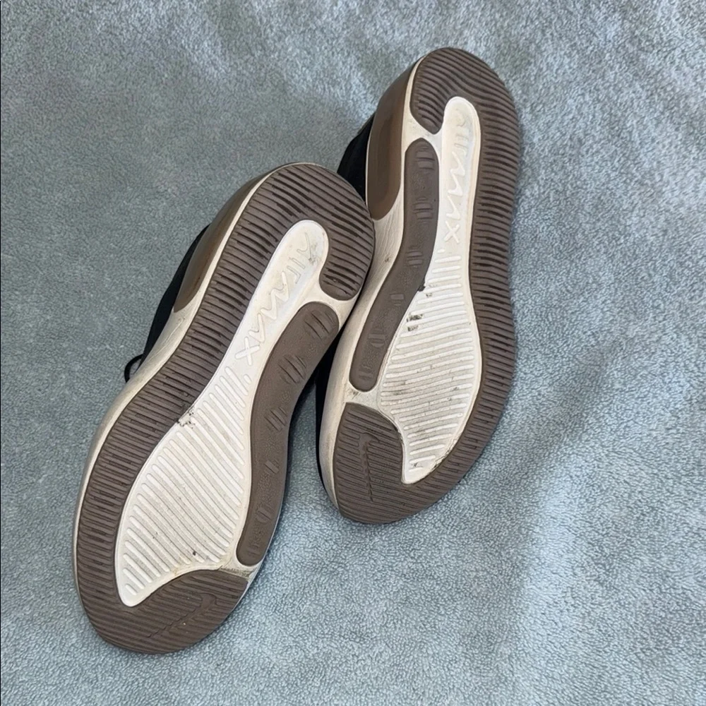Nike women’s Black and Tan Sneakers